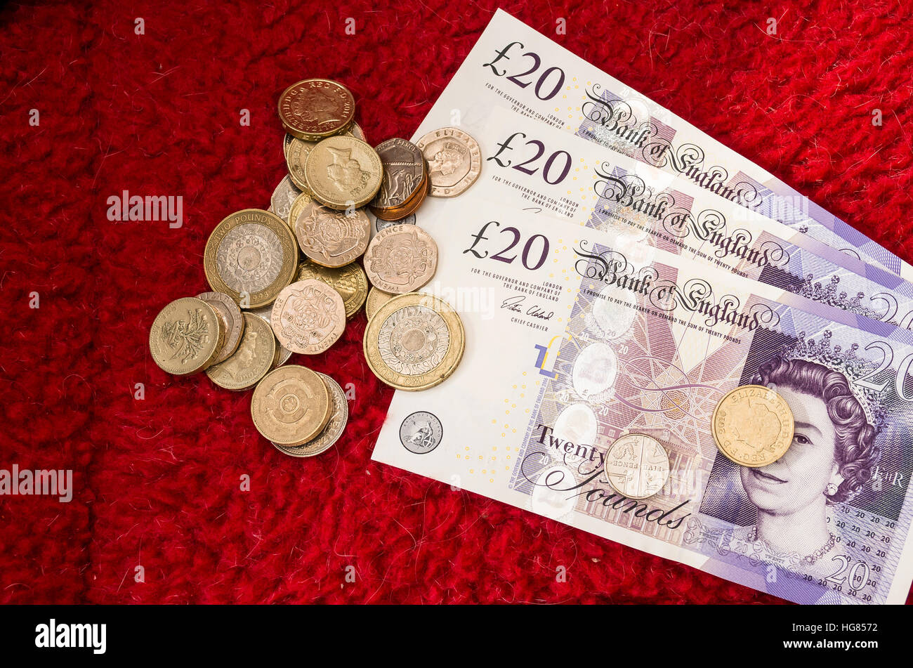 UK British currency notes and coins Stock Photo