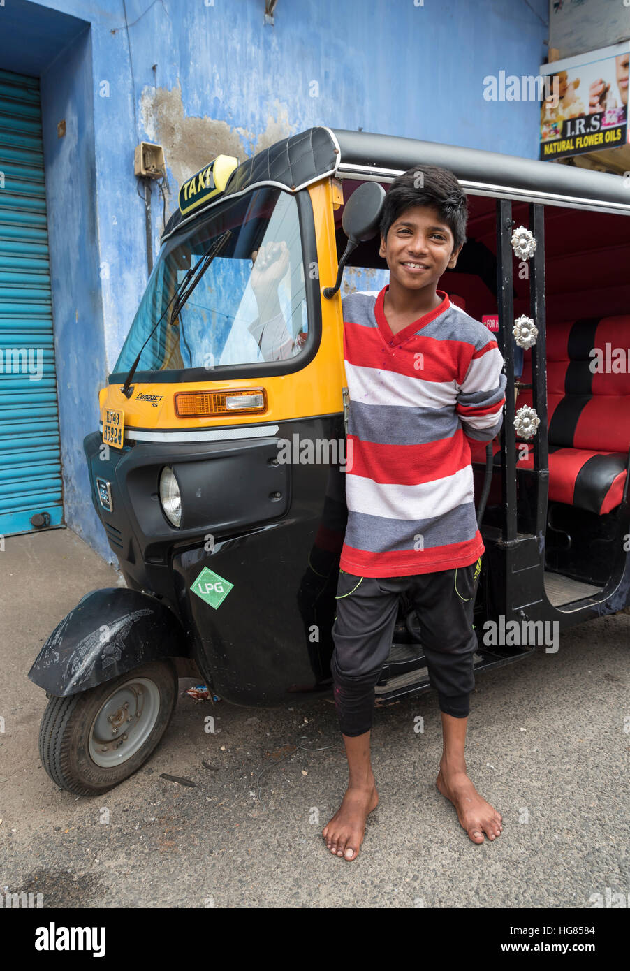 Boy with autorickshaw, Jew Town, Fort Kochi, Cochin, Kerala, India Stock Photo
