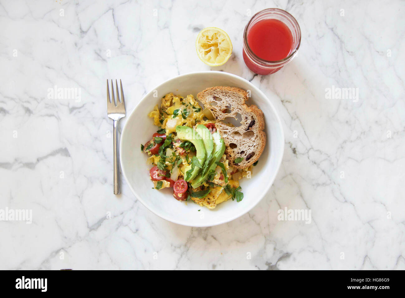 Overhead view of healthy food and drink served on marble counter Stock Photo