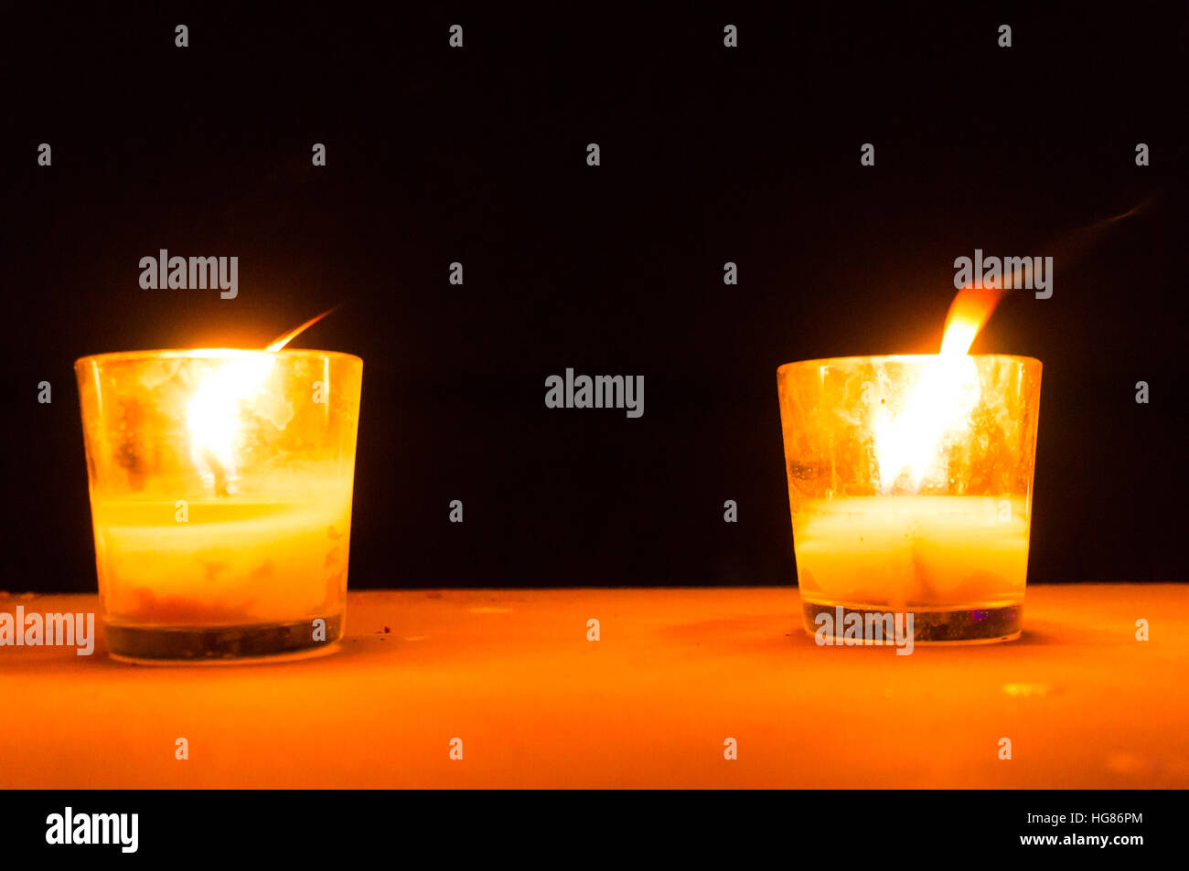 Candles in glass jars put as romantic lamps Stock Photo Alamy