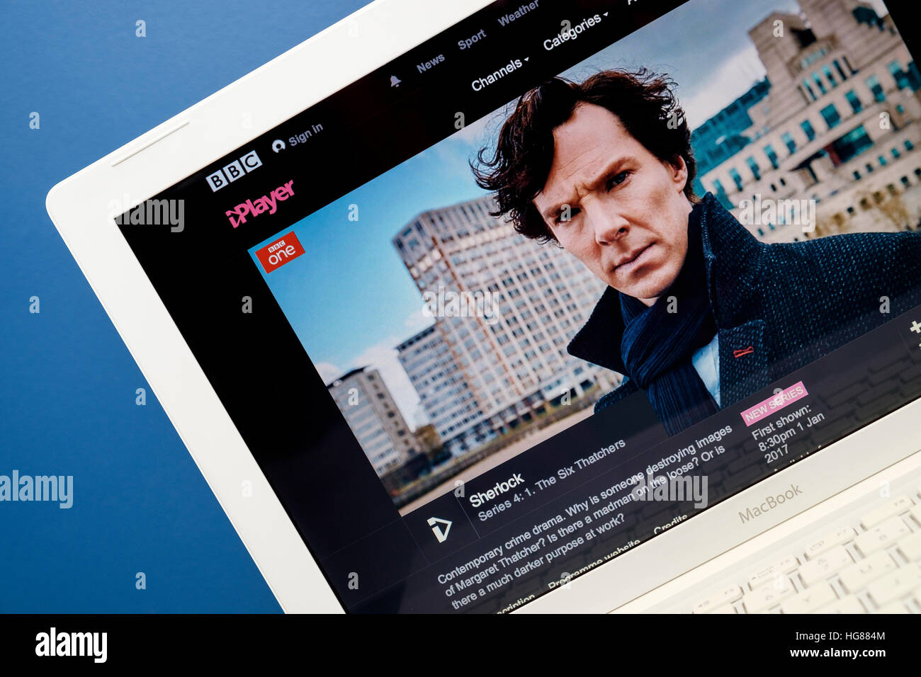 BBC iplayer website playing the tv show Sherlock viewed on a laptop computer screen Stock Photo