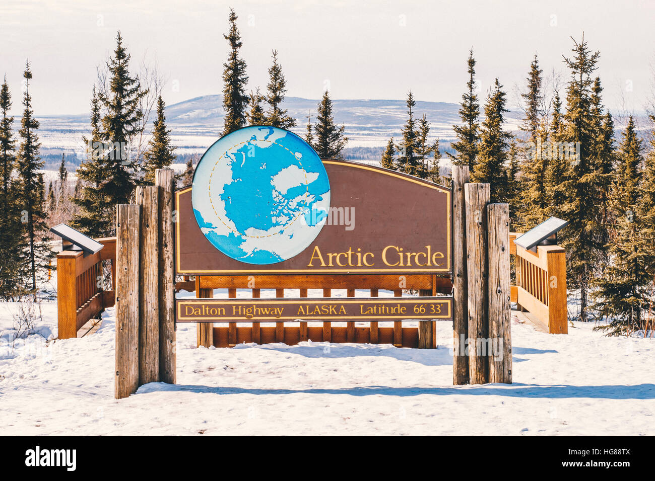 Dalton highway with Arctic Circle sign during winter Stock Photo