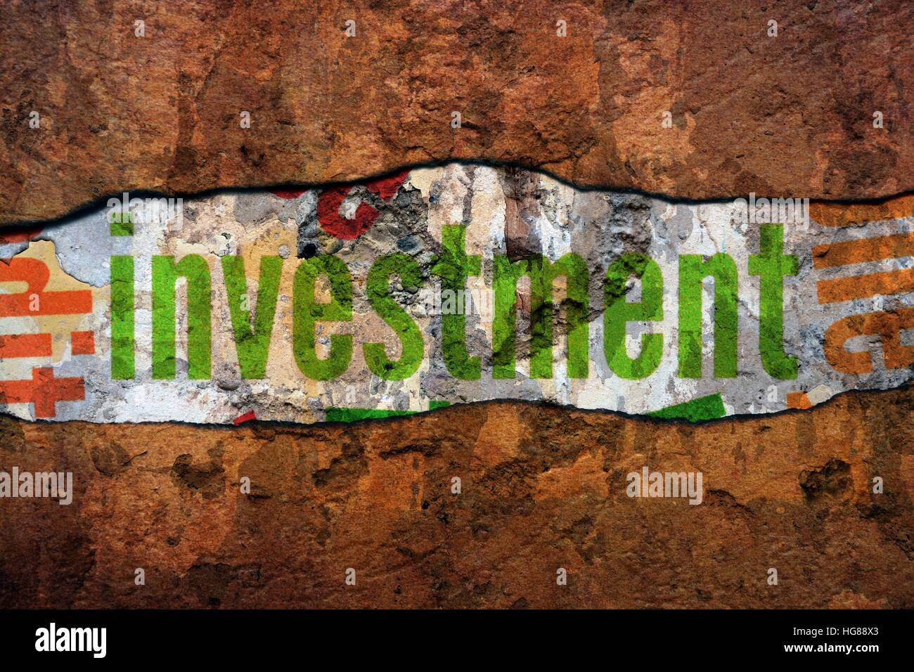 Investment text on torn paper Stock Photo - Alamy