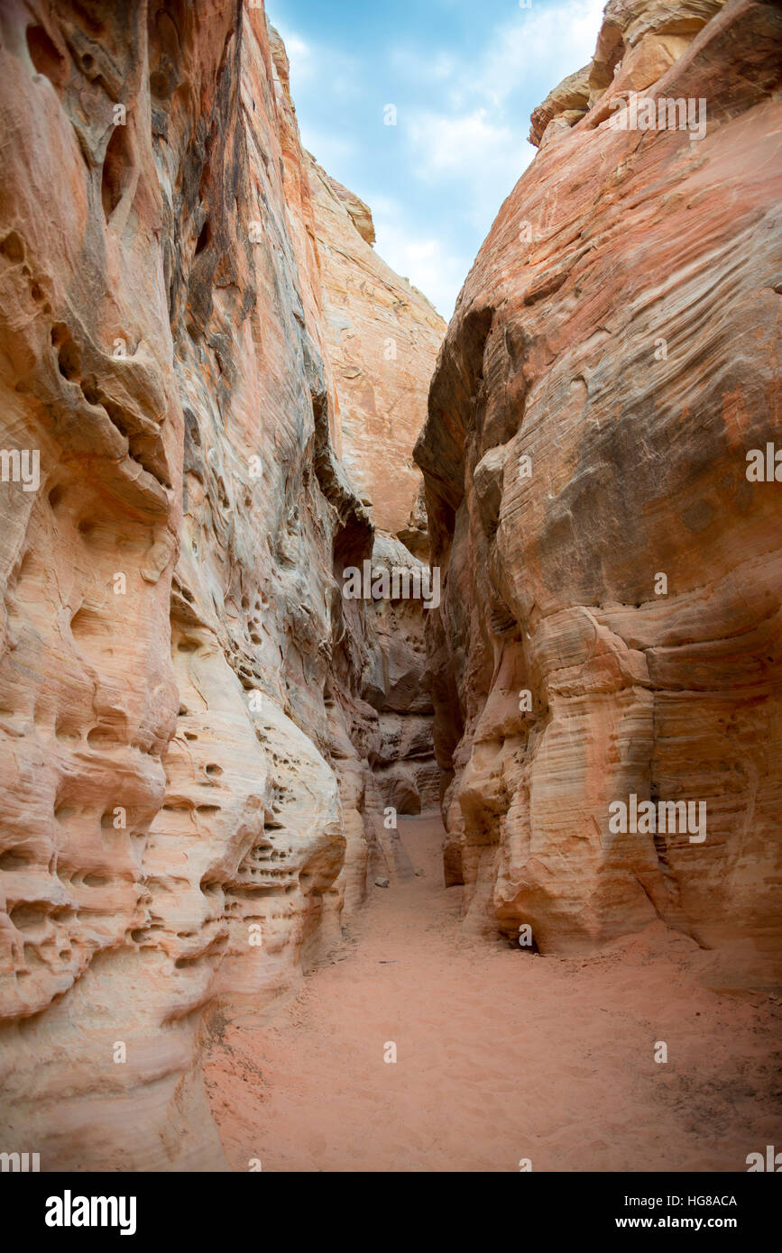 Slot Canyon, White Dome Trail, red orange sandstone rock, Valley of Fire State Park, Nevada, USA Stock Photo