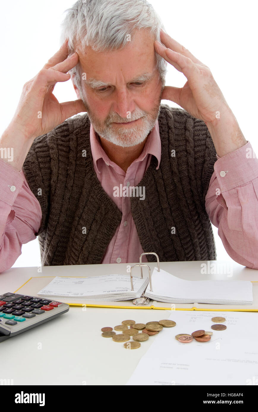 Thoughtfully man watching his statements of account Stock Photo