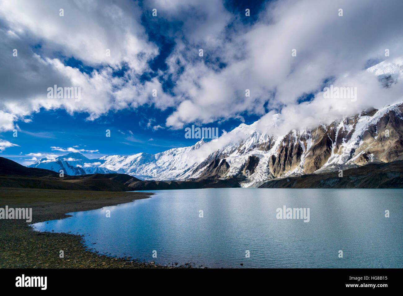 Tilicho Lake with snow-covered mountains, Manang, Manang District, Nepal Stock Photo