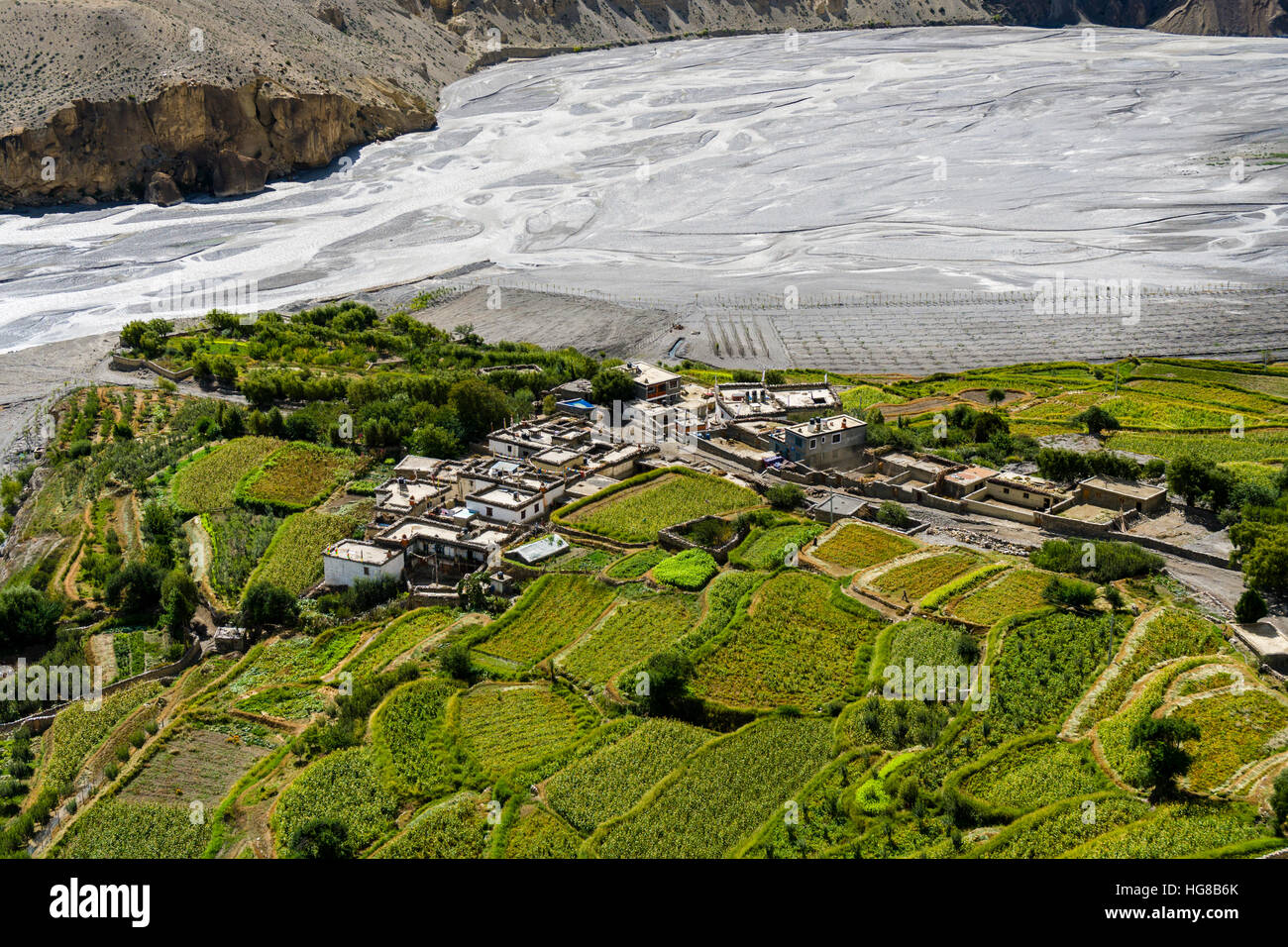 Aerial view of village, Tiri Gompa in Upper Mustang, located on green peninsula in Kali Gandaki valley, Tiri, Mustang District Stock Photo