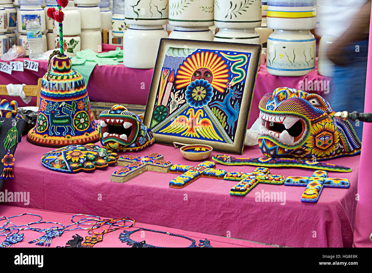 Handicraft made with beads representing various figures made in Mexico Stock Photo