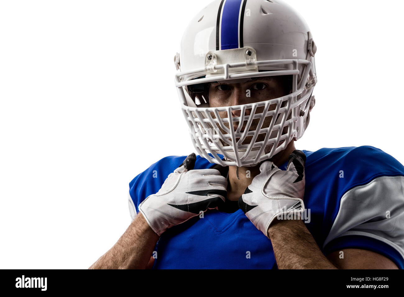 Football Player with a blue uniform on a white background Stock Photo