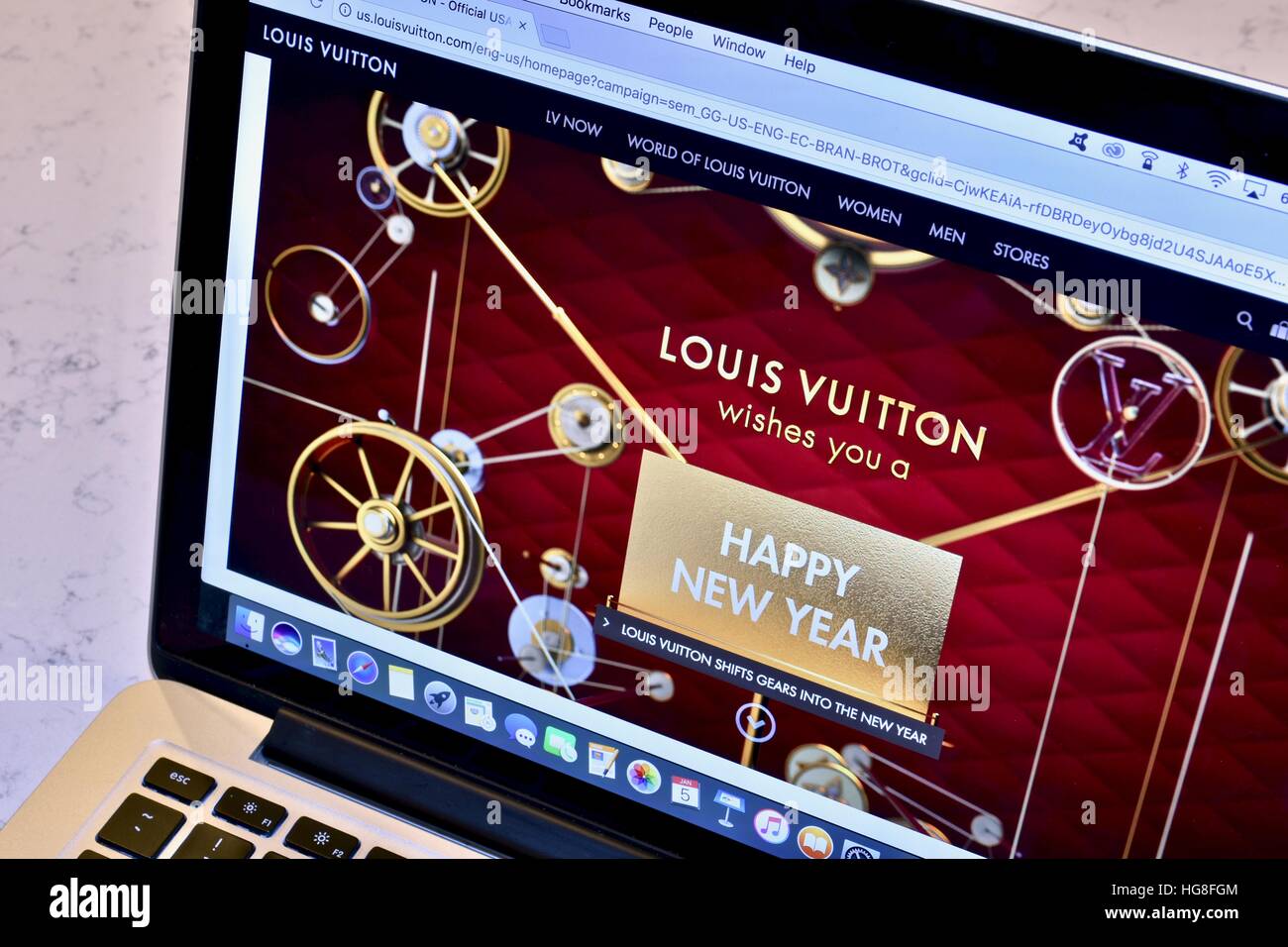 The Louis Vuitton website on an Apple Macbook Pro Stock Photo Alamy