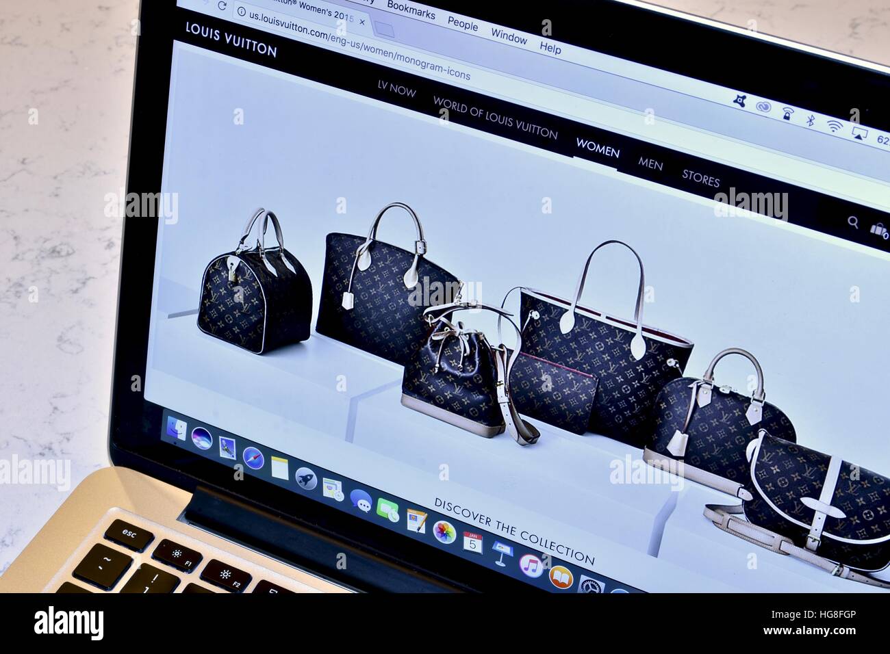 The Louis Vuitton Website Displayed On An Apple Macbook Pro Stock Photo Alamy