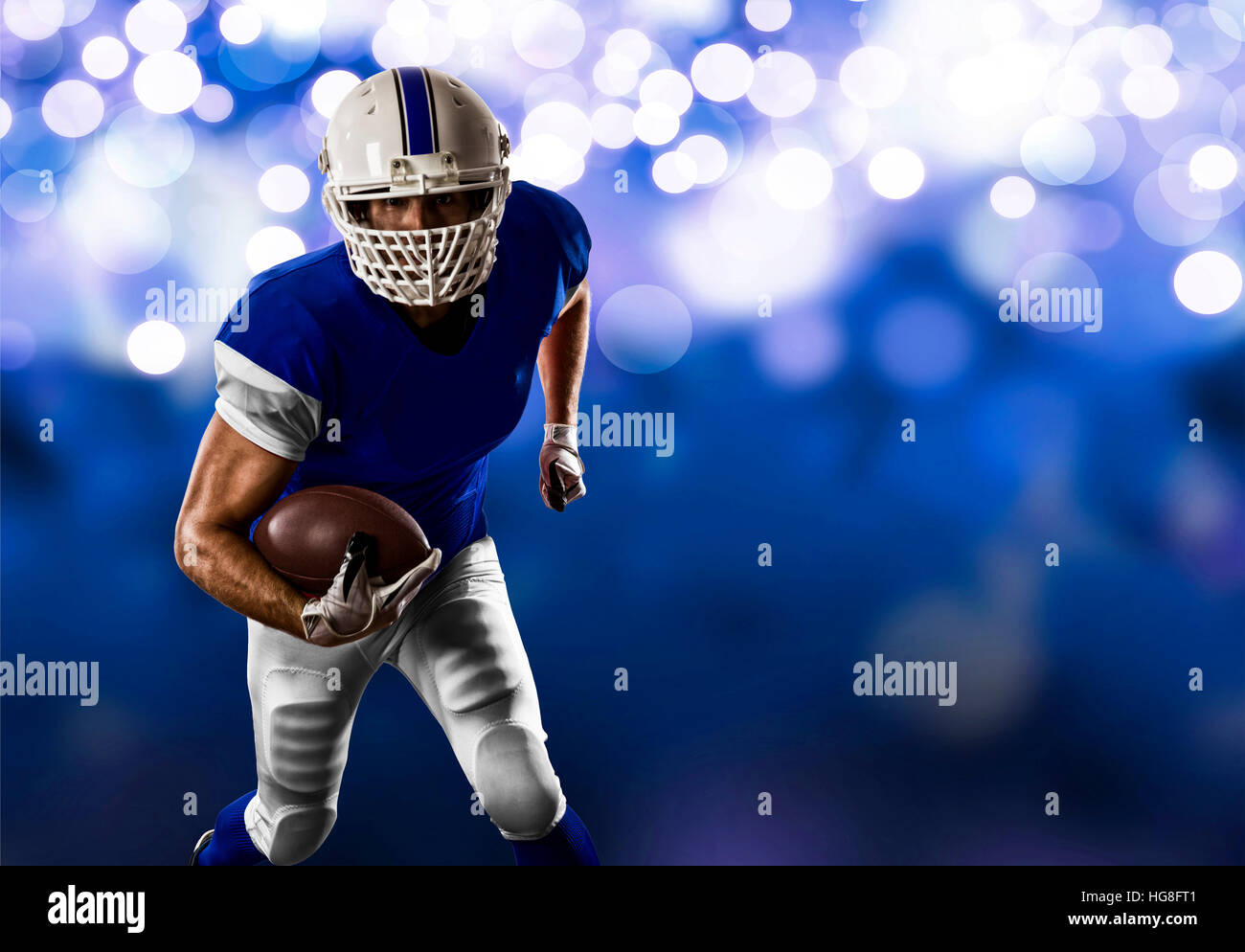 Football Player with a blue uniform Running on a blue lights