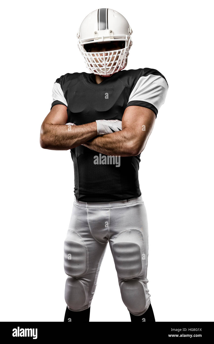 Football Player with a Black uniform on a white background Stock Photo