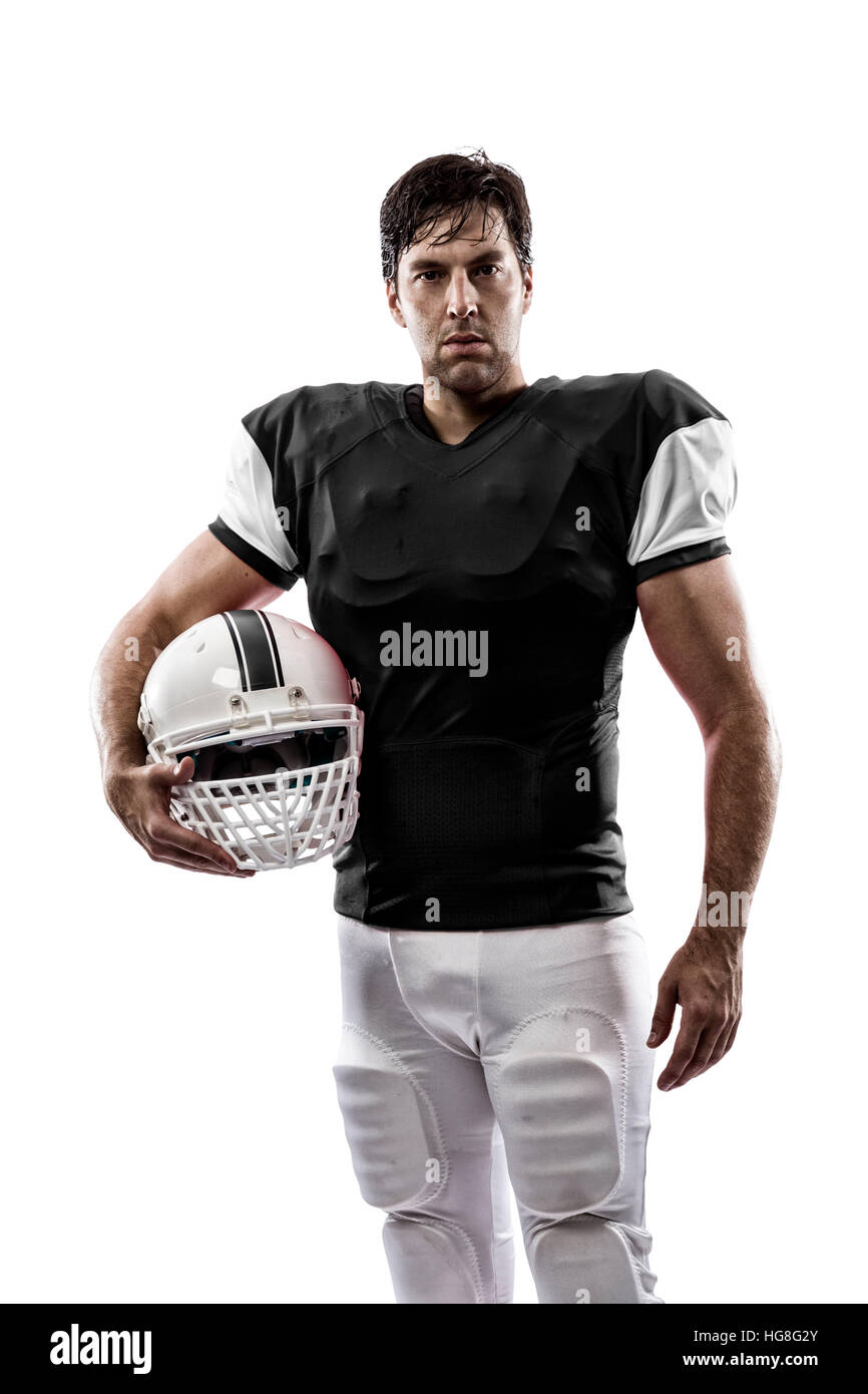Football Player with a Black uniform on a white background Stock Photo