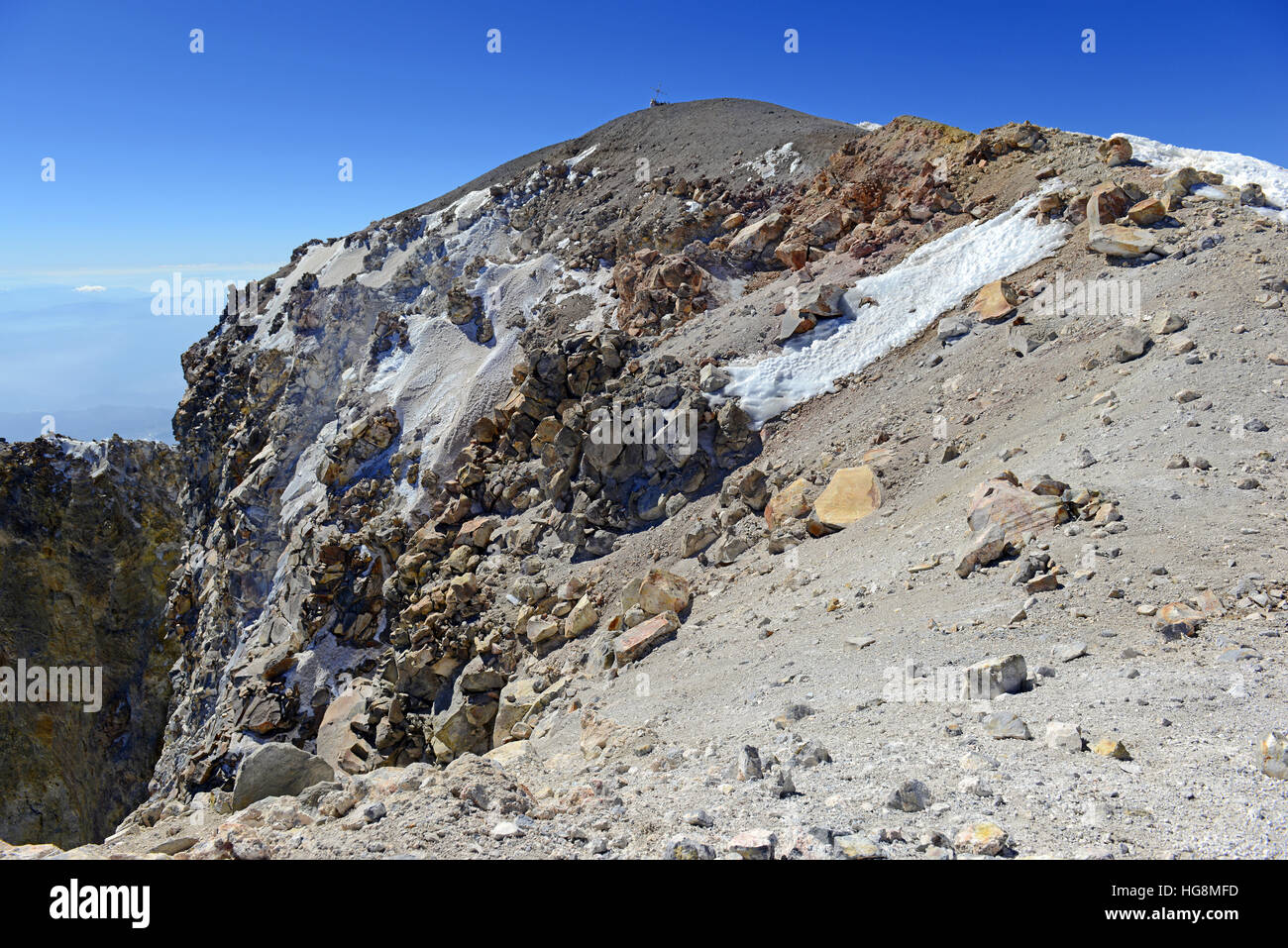 Alpine terrain with rock, snow and ice on Pico de Orizaba volcano, or Citlaltepetl, the highest mountain in Mexico Stock Photo