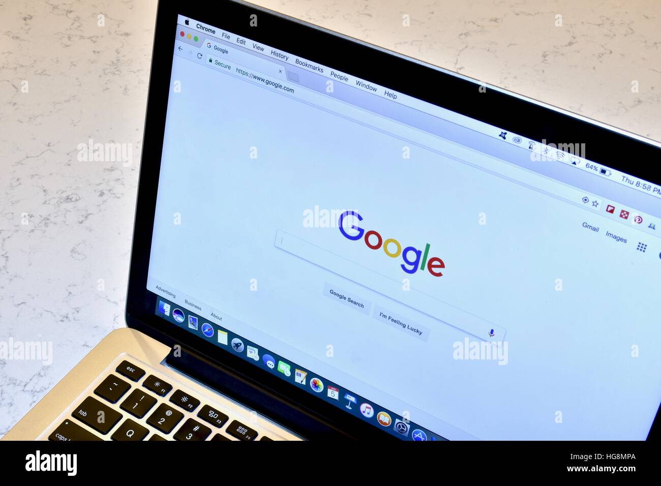 An Apple Macbook Pro with the Google search engine displayed on the screen  Stock Photo - Alamy