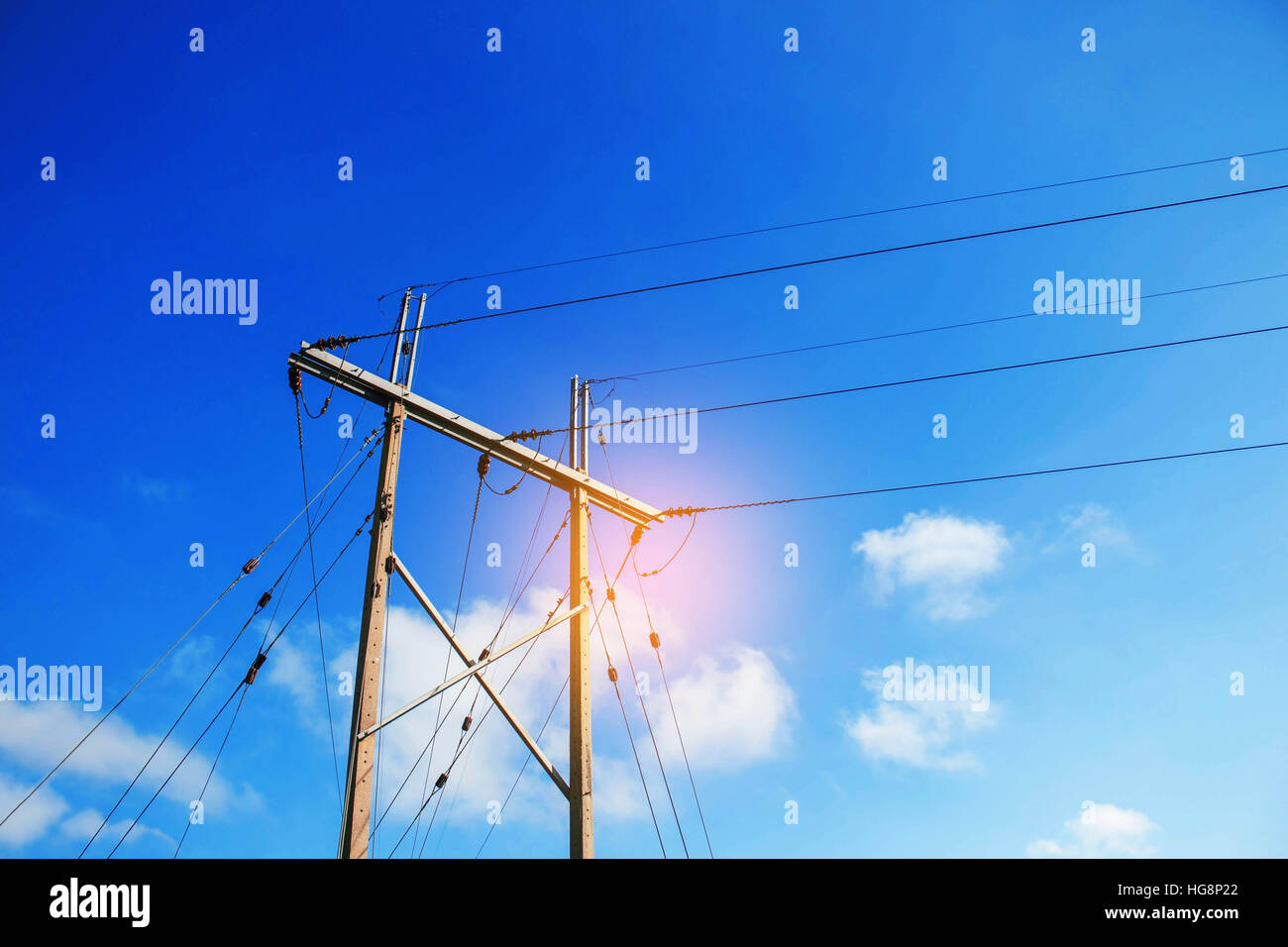 Electricity poles and wires with the blue sky Stock Photo - Alamy