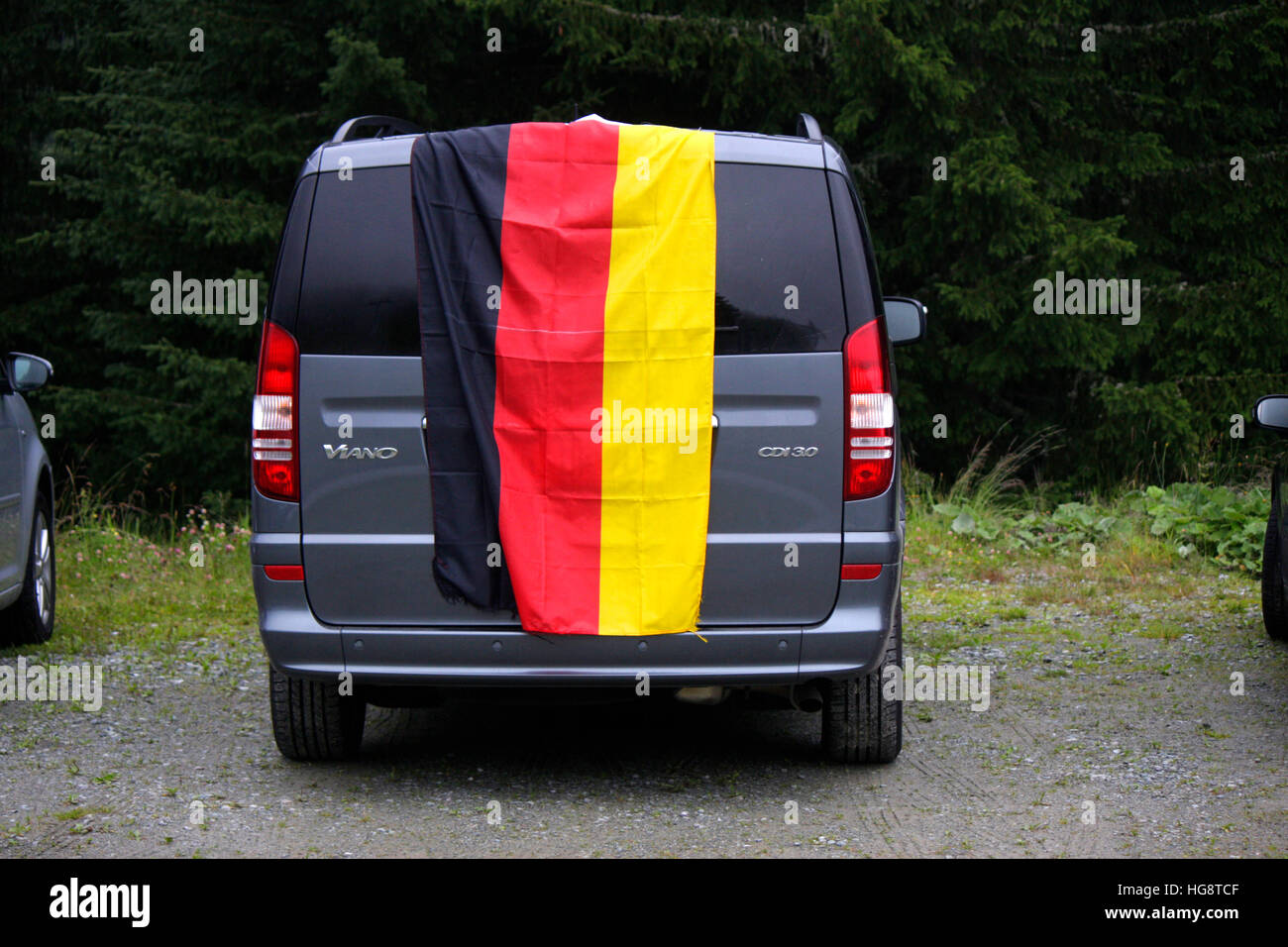 deutsche Fahne auf deutschem Auto, Oesterreich. Stock Photo