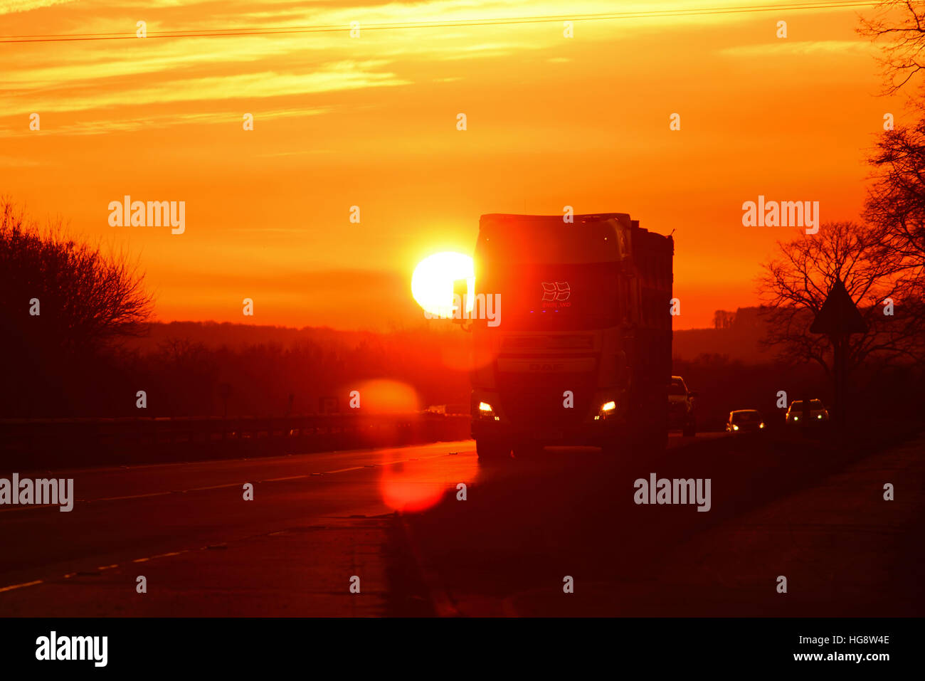 lorry travelling at sunset on the A64 dual carriageway york yorkshire united kingdom Stock Photo