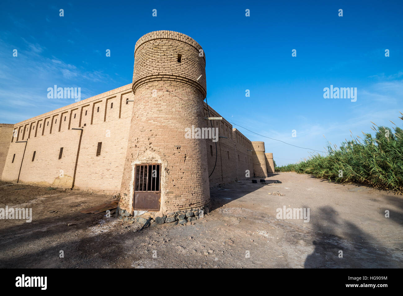 Watchtower of historical Caravansarai at former silk road on Maranjab Desert located in Aran va bidgol County in Iran Stock Photo