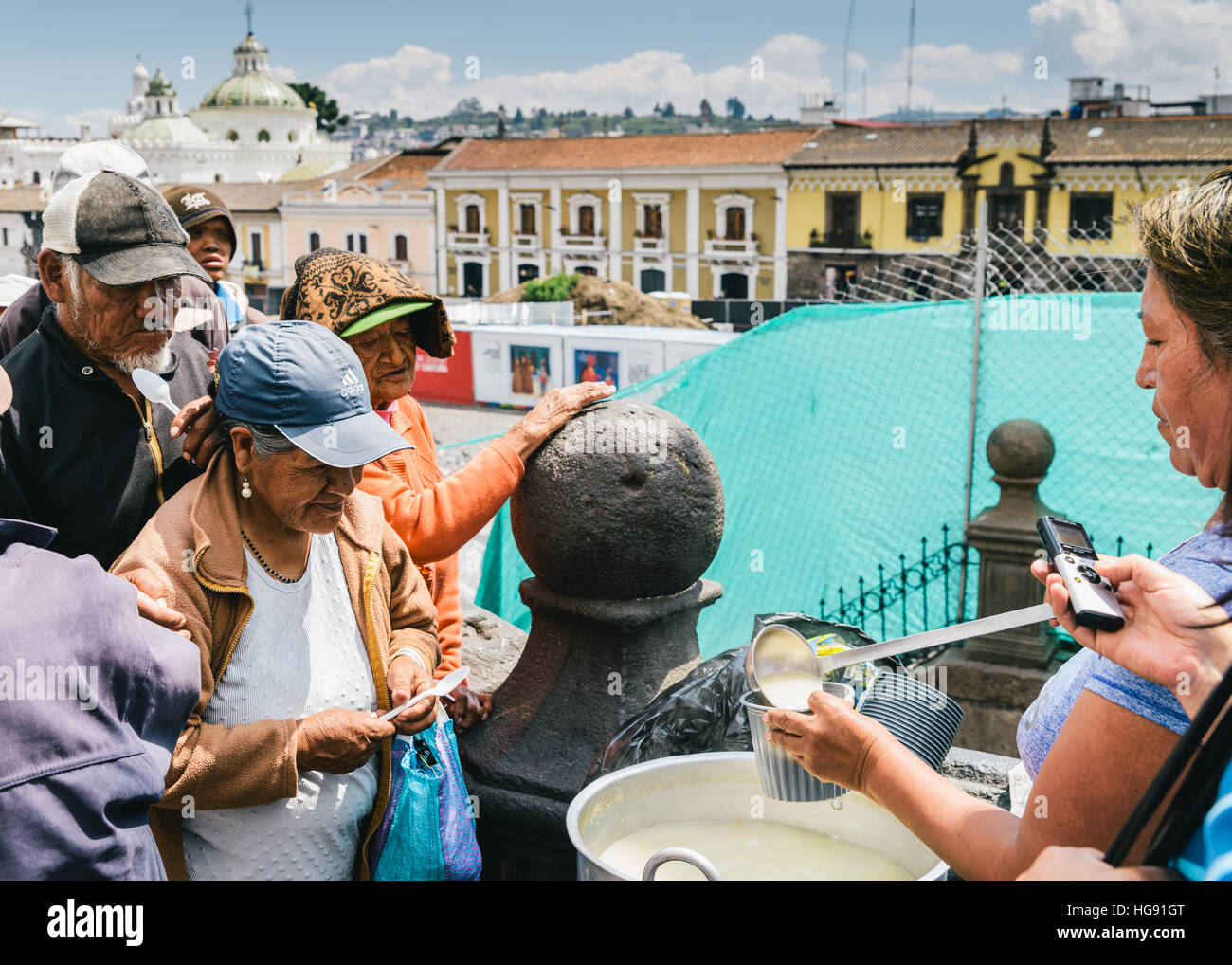 Unidentified Ecuadorian women with bowler hats. 71,9% of Ecuadorian people belong to the Mestizo ethnic group during food drive Stock Photo