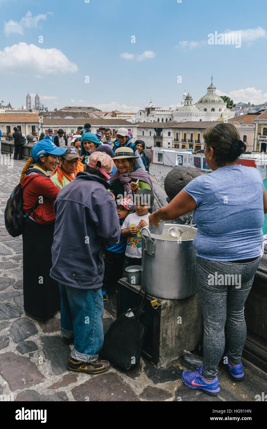 Unidentified Ecuadorian women with bowler hats. 71,9% of Ecuadorian people belong to the Mestizo ethnic group during food drive Stock Photo