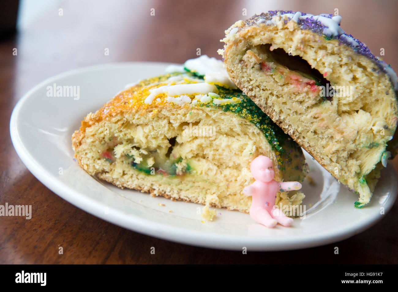 Plated slices of New Orleans king cake. Stock Photo