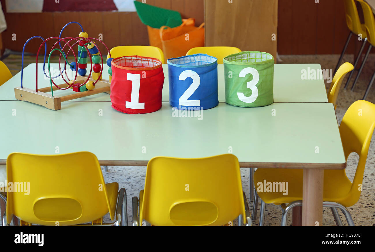 Three jar with big writing 1 2 3 into a kindergarten classroom Stock Photo