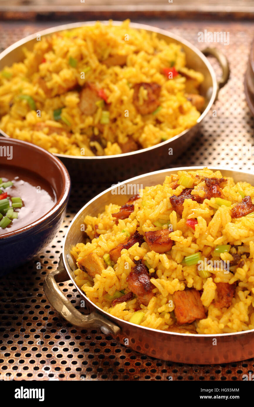Chicken with basmati rice fried in stainless pan Stock Photo Alamy