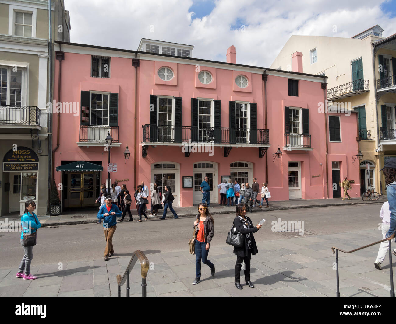 Famous Brennans Restaurant, New Orleans French Quarter. Asian tourists take selfies in front of the restaurant. Stock Photo