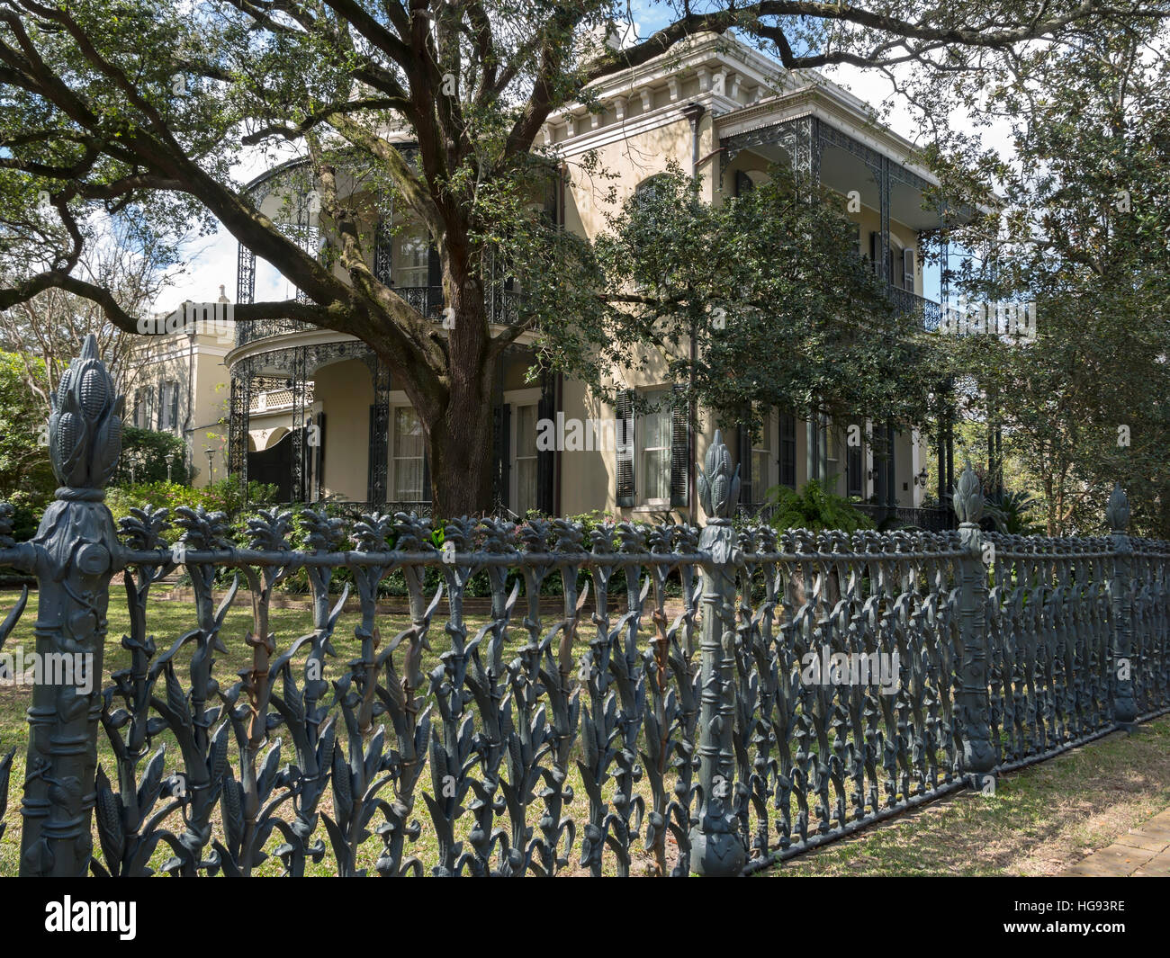 Cornstalk fence surrounds a mansion in the Garden District, New Orleans Stock Photo