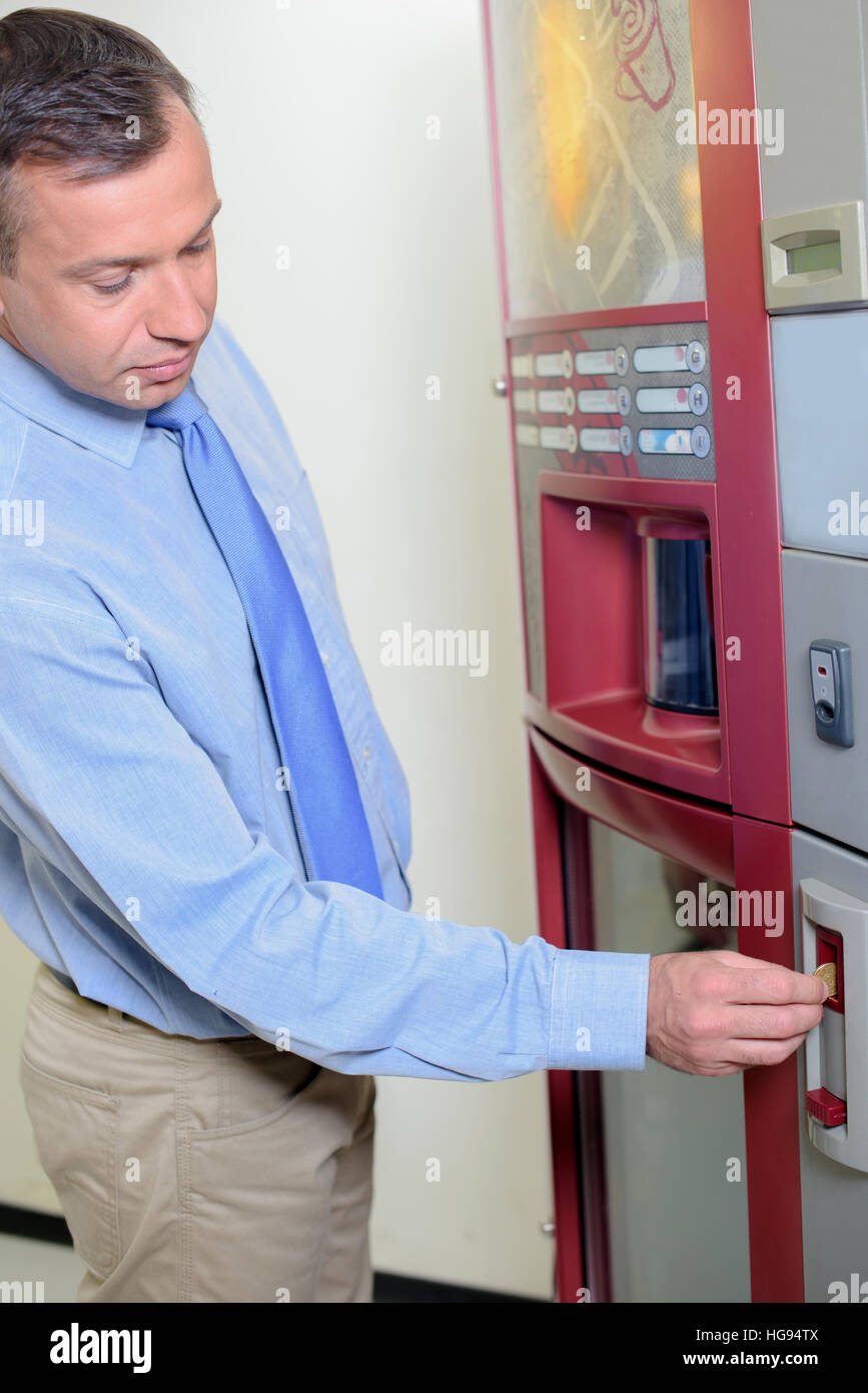 man using the vending machine Stock Photo