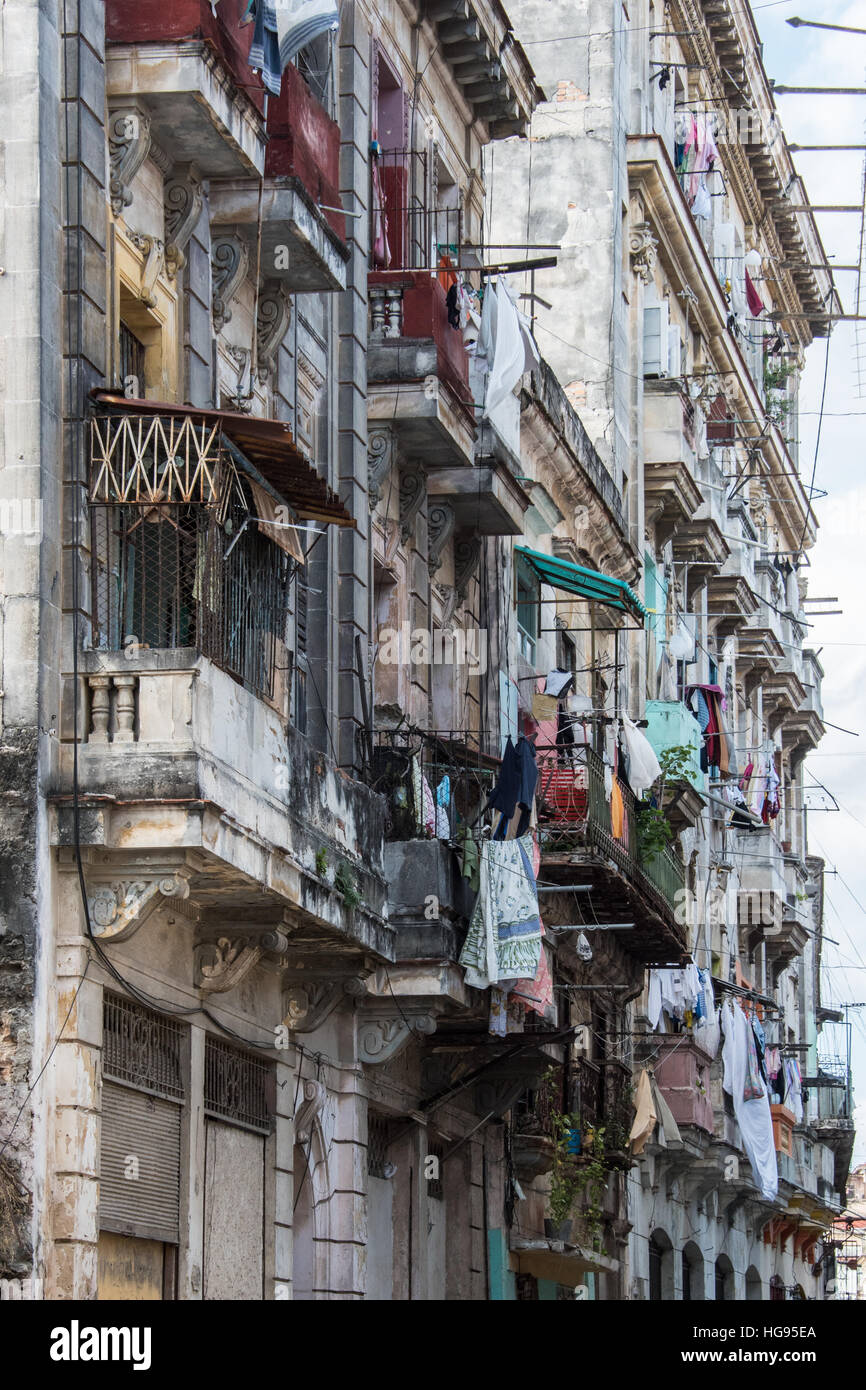 Old Havana Apartment Building with Balconies and Washing Stock Photo