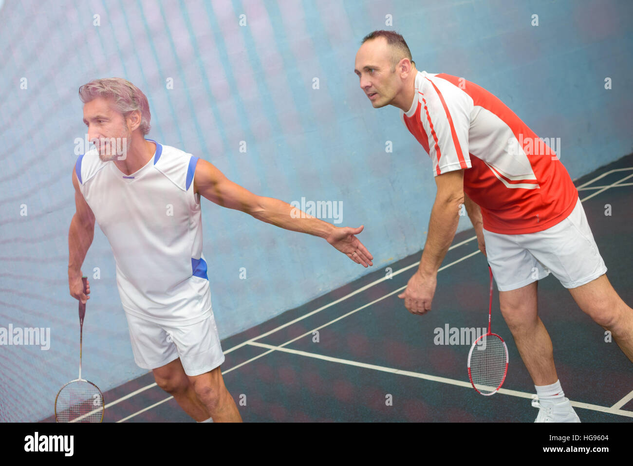 a doubles badminton game Stock Photo Alamy