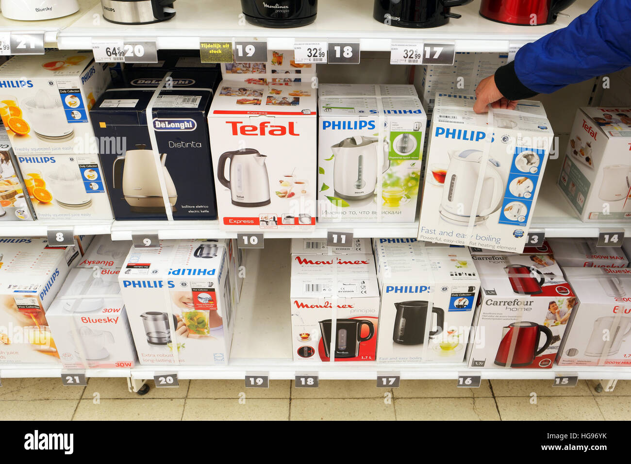Different brands electric water boilers in a Carrefour Hypermarket Stock Photo
