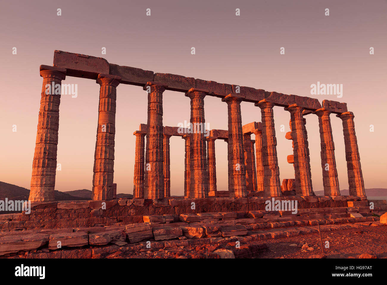 Poseidon Temple Ruins at sunset in Cape Sounion Stock Photo - Alamy