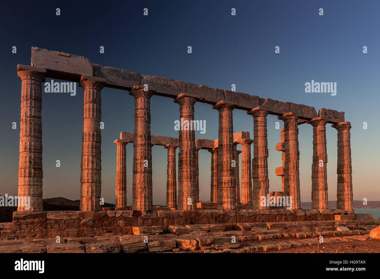 Poseidon Temple Ruins at sunset in Cape Sounion Stock Photo - Alamy