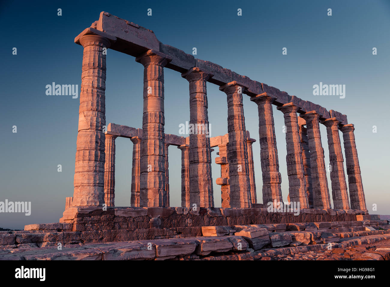 Poseidon Temple Ruins at sunset in Cape Sounion Stock Photo - Alamy