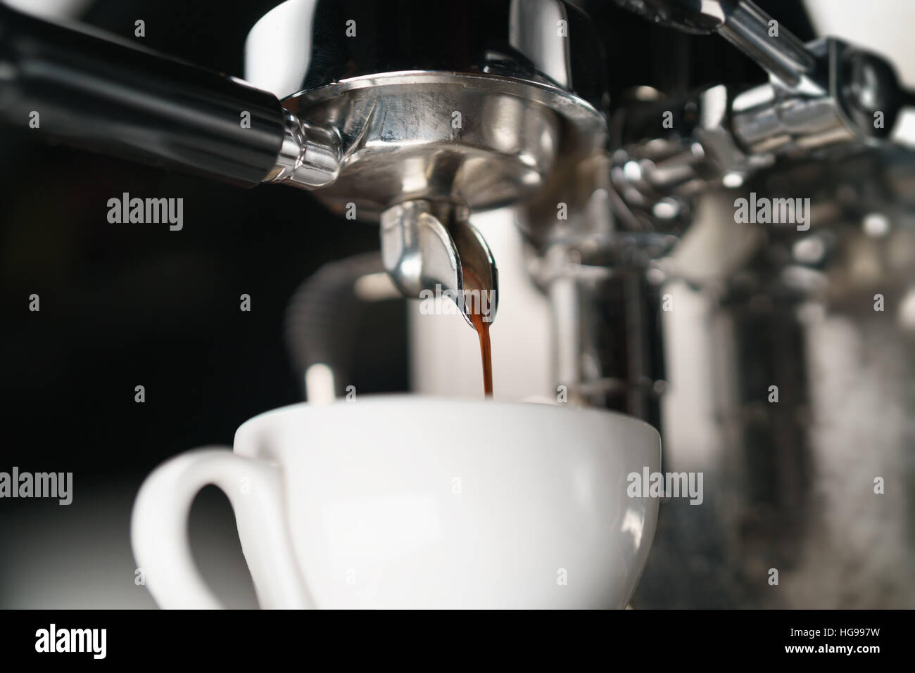 coffee extraction process from professional espresso machine Stock Photo Alamy