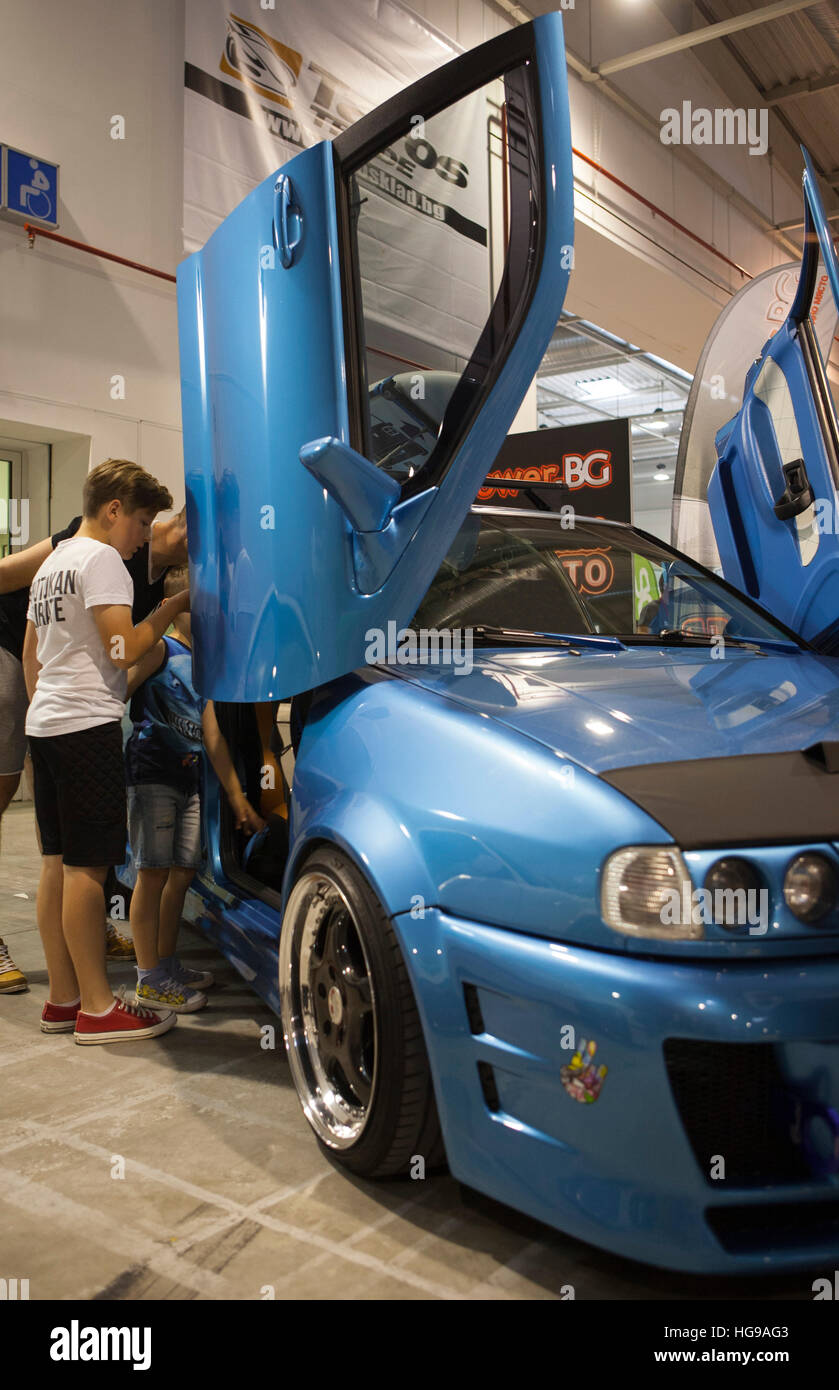 Car tuning style alien at Motor Show. – Stock Editorial Photo © grigvovan  #93815140