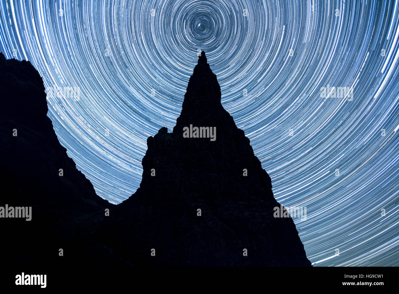 Long exposure of the north star, polaris, directly over needle rock at the old man of storr, isle of skye, scotland, UK Stock Photo