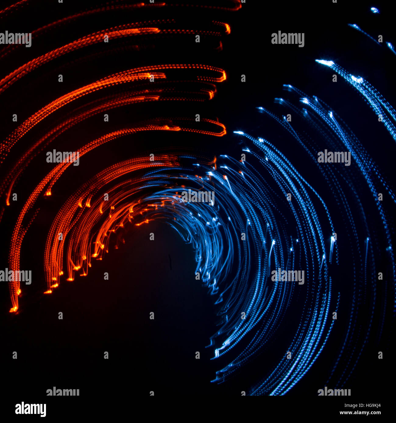 Colorful abstract trails of light. Dots, lines and bokeh on dark ...