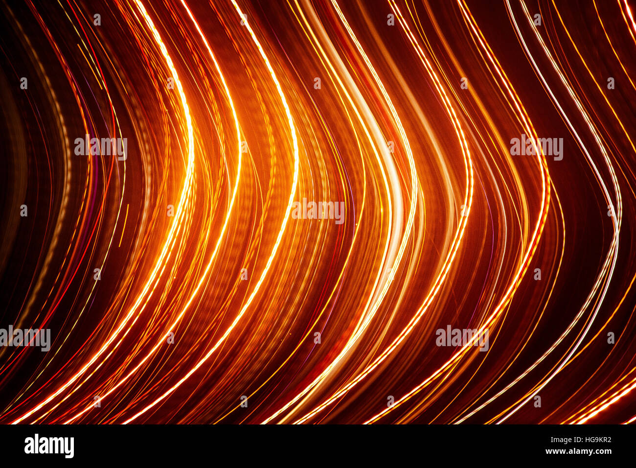 Red abstract trails of light on dark background. Long exposure Stock ...