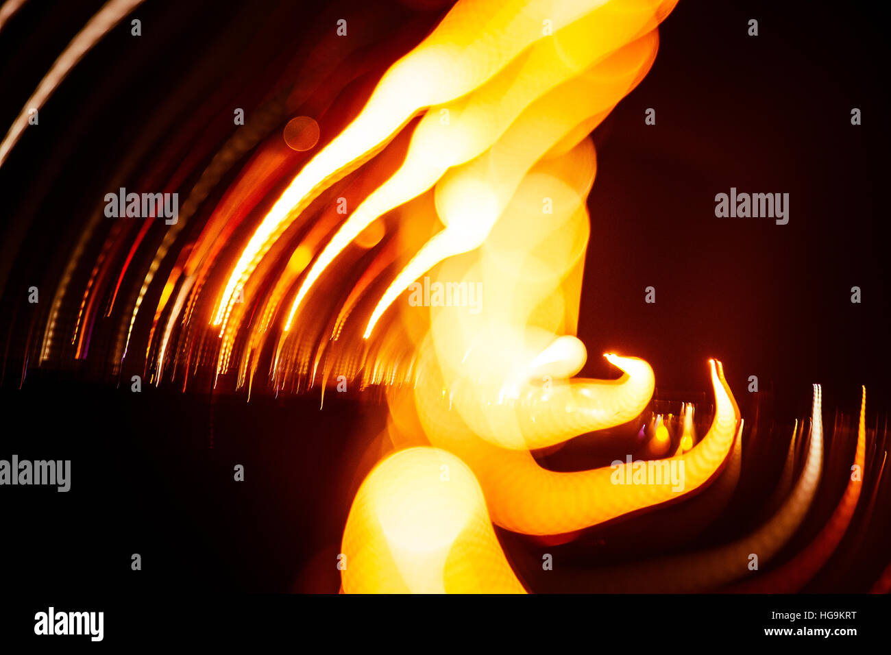 Red abstract trails of light on dark background. Long exposure Stock ...