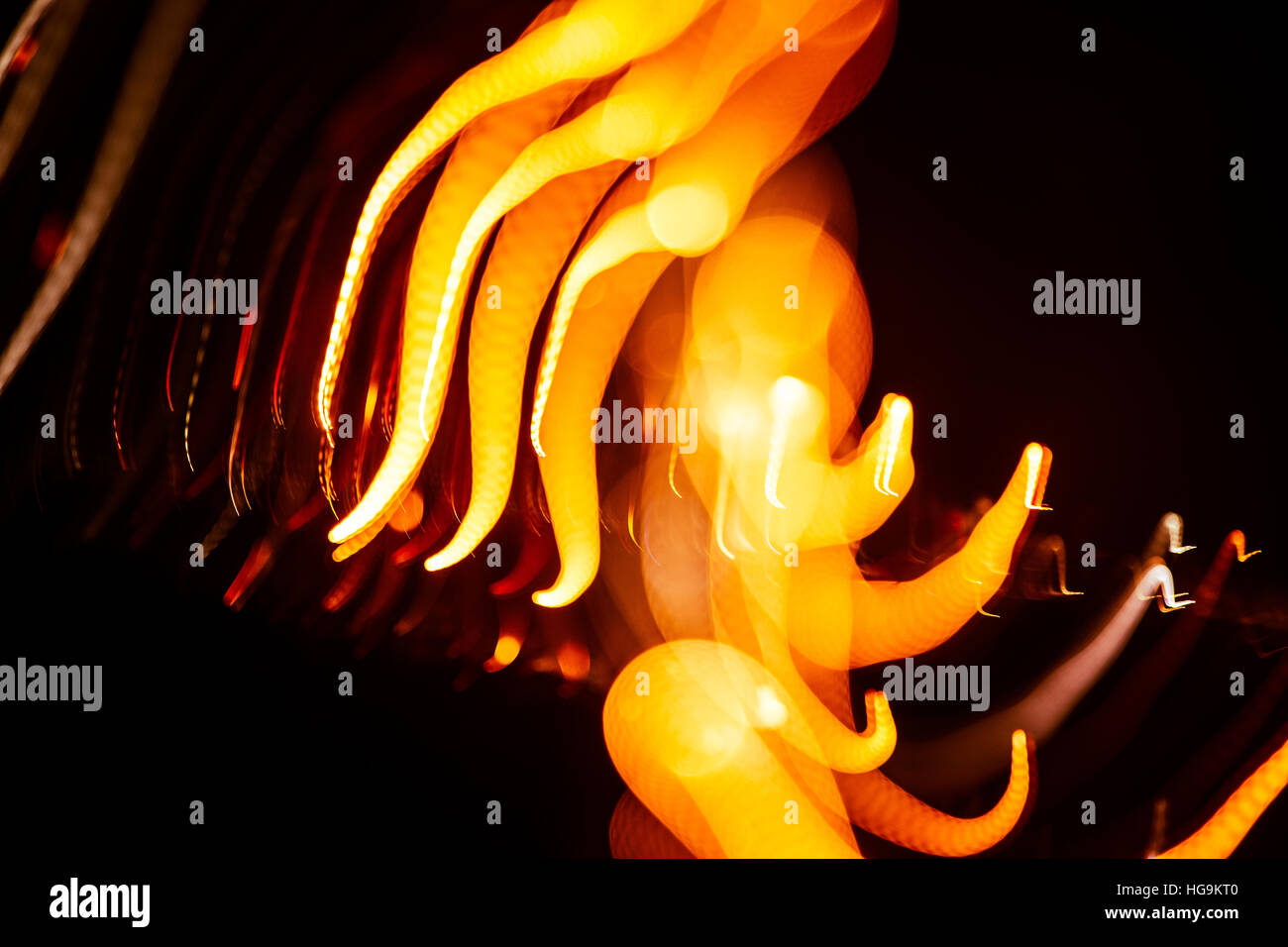 Red abstract trails of light on dark background. Long exposure Stock ...