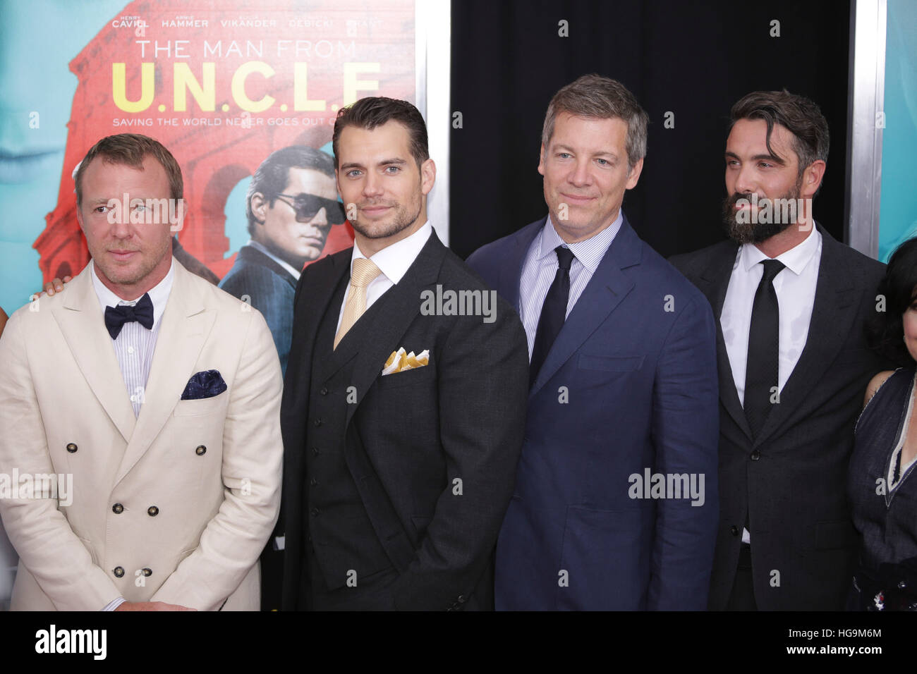 Guy Ritchie, Henry Cavill, Lionel Wigram and Luca Cavalli arrive at The Man From U.N.C.L.E premiere at the Zigfield Theater in NYC. Stock Photo