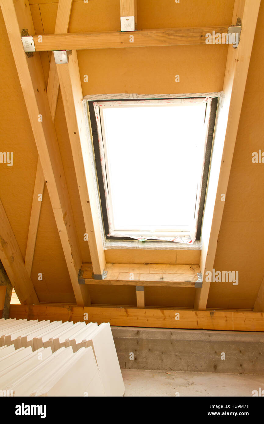 Dormer window on a new roof Stock Photo