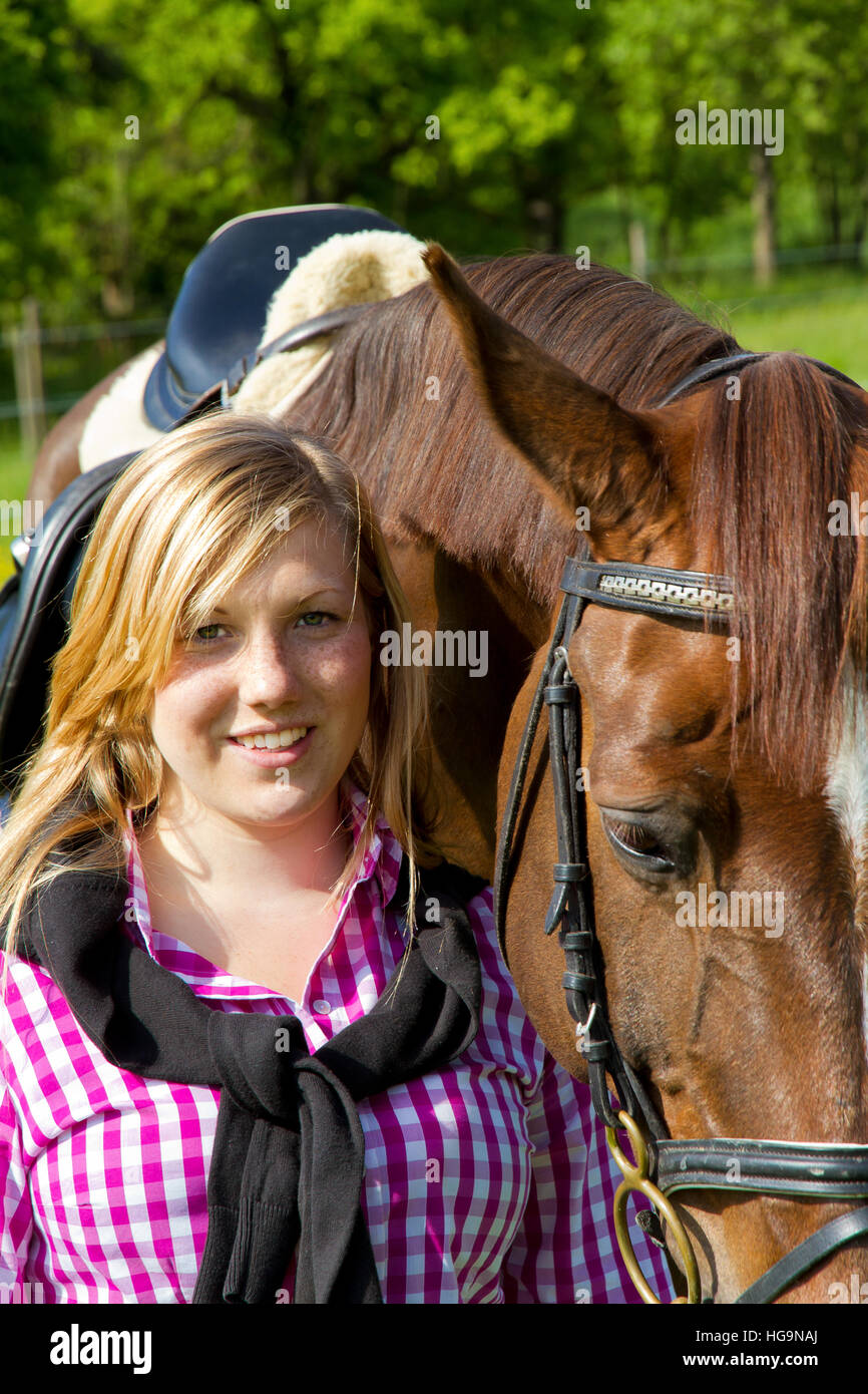 Portrait of a happy girl and her horse Stock Photo