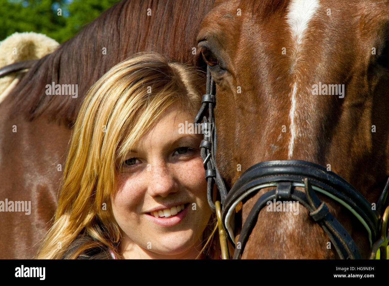 Portrait of a happy girl and her horse Stock Photo