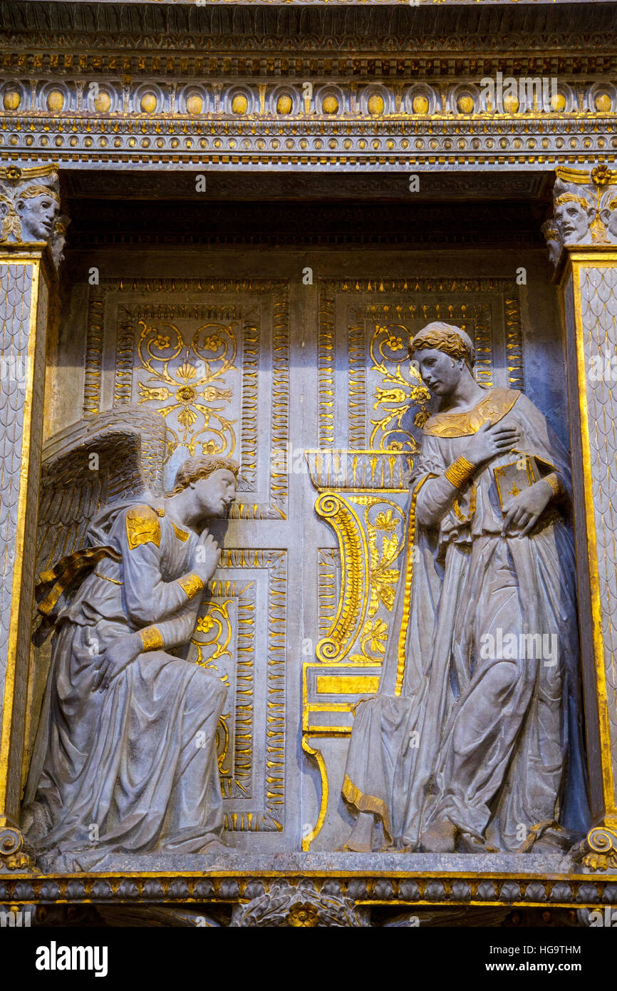 The Tabernacle by Donatello featuring Angel and The Virgin standing in Santa Croce Basilica in Florence Italy Stock Photo